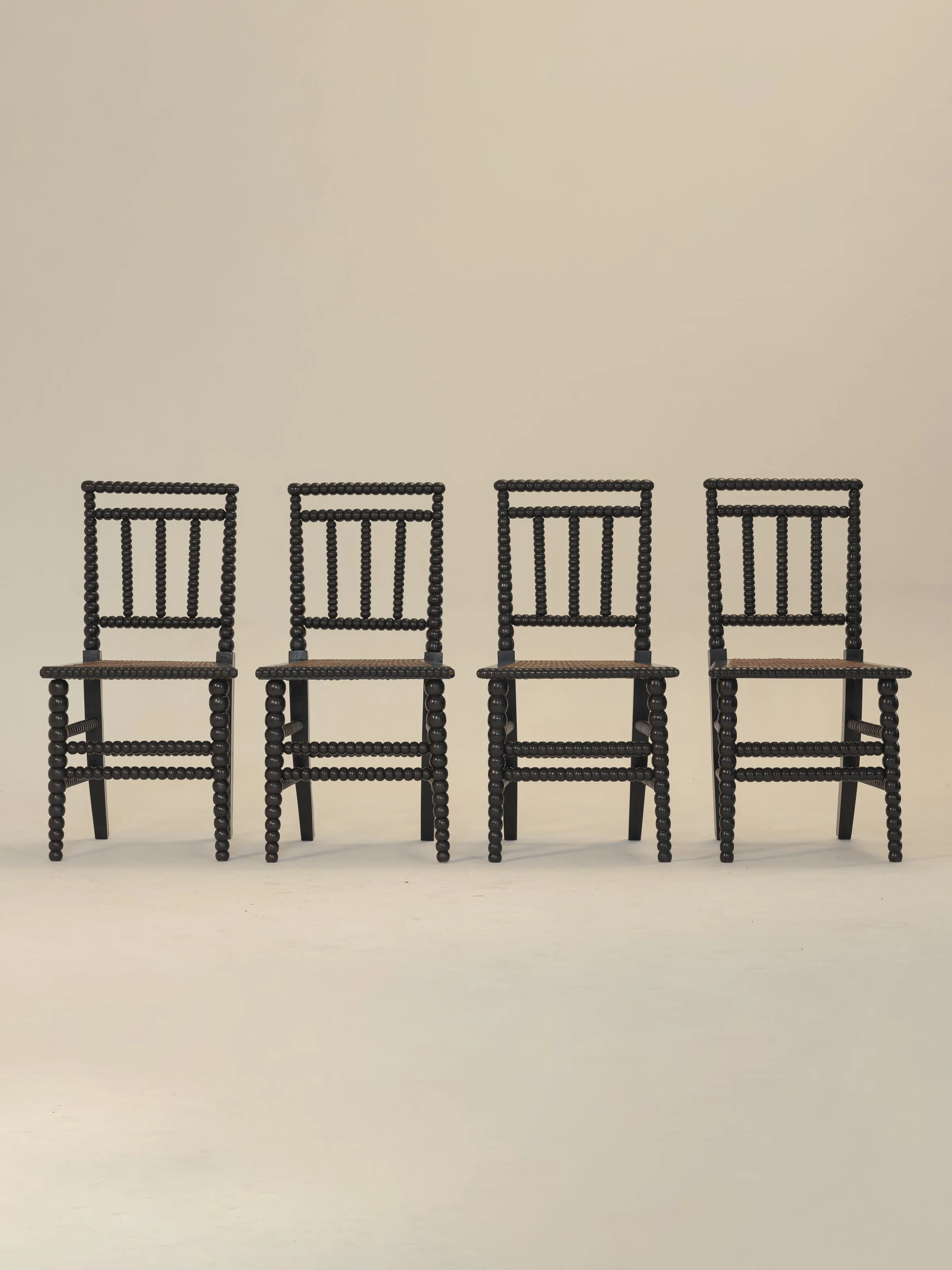 Set of Eight Ebonised Bobbin Chairs